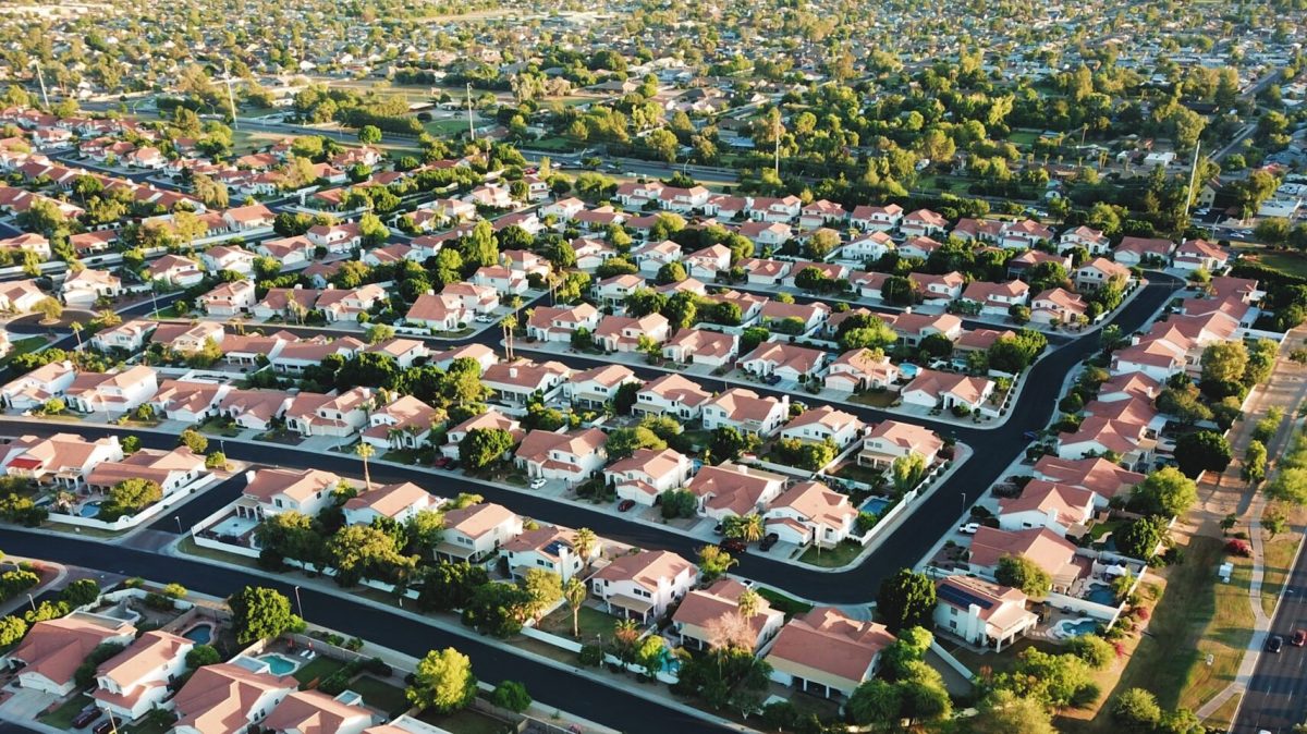 Aerial view of suburban neighborhood with grid-pattern streets and residential homes