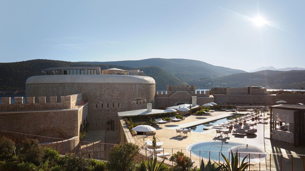 Banyan Tree Mamula Island resort with fortress architecture overlooking Adriatic waters and mountains