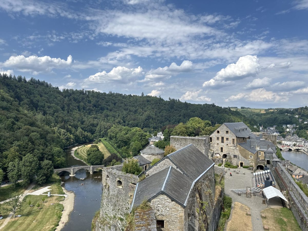 Bouillon Castle overlooks the River Semois with forested Ardennes hills in the background