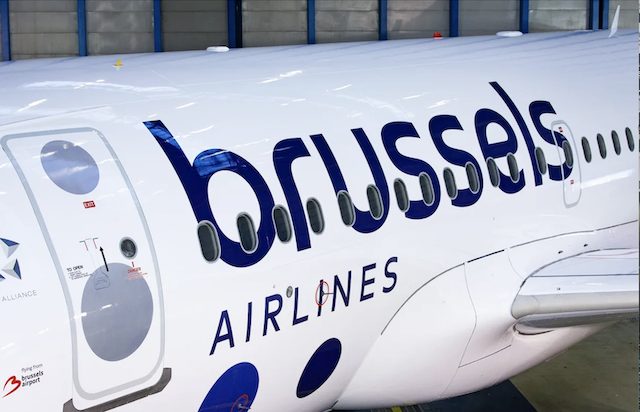 Close-up of Brussels Airlines aircraft fuselage showing company logo and branding