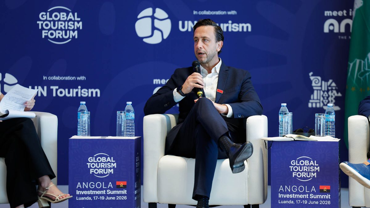 Business executive speaking at Global Tourism Forum Angola Investment Summit panel