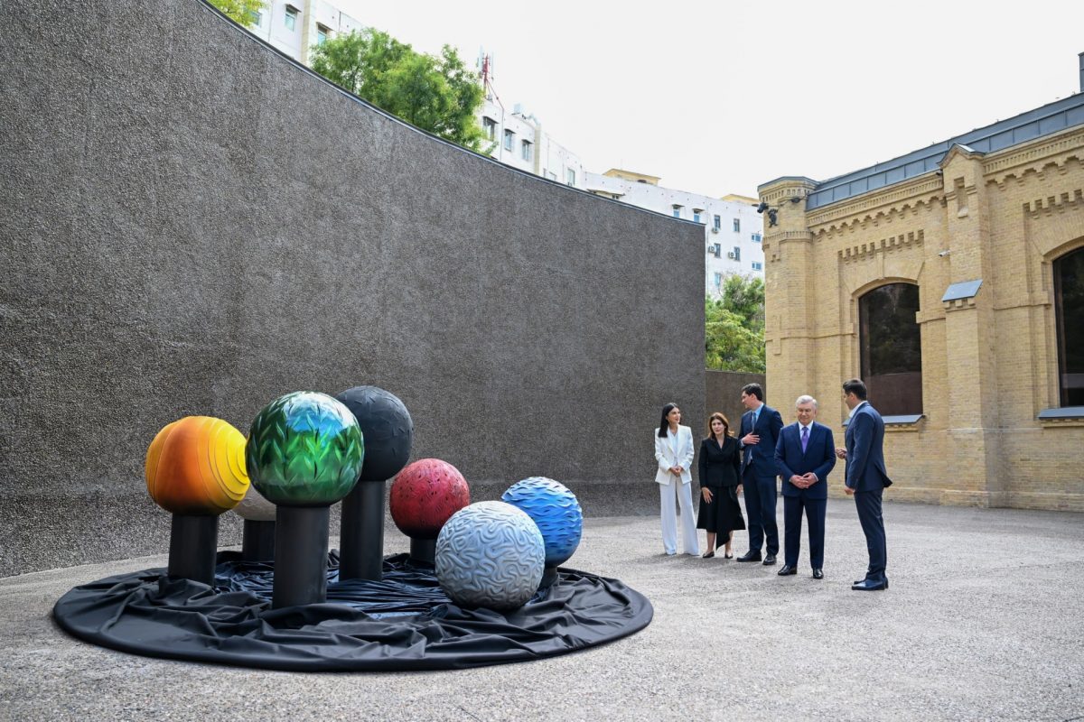 Contemporary art installation and visitors at the Tashkent Arts Centre, formerly a tram depot.