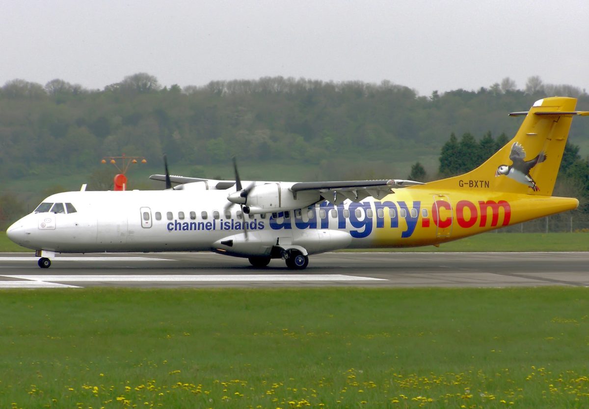 Aurigny Air Services ATR 72 aircraft on runway with yellow and white livery