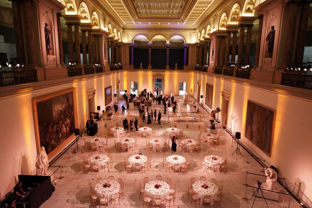 Elegant ballroom at Royal Museum with round tables set for formal ceremony