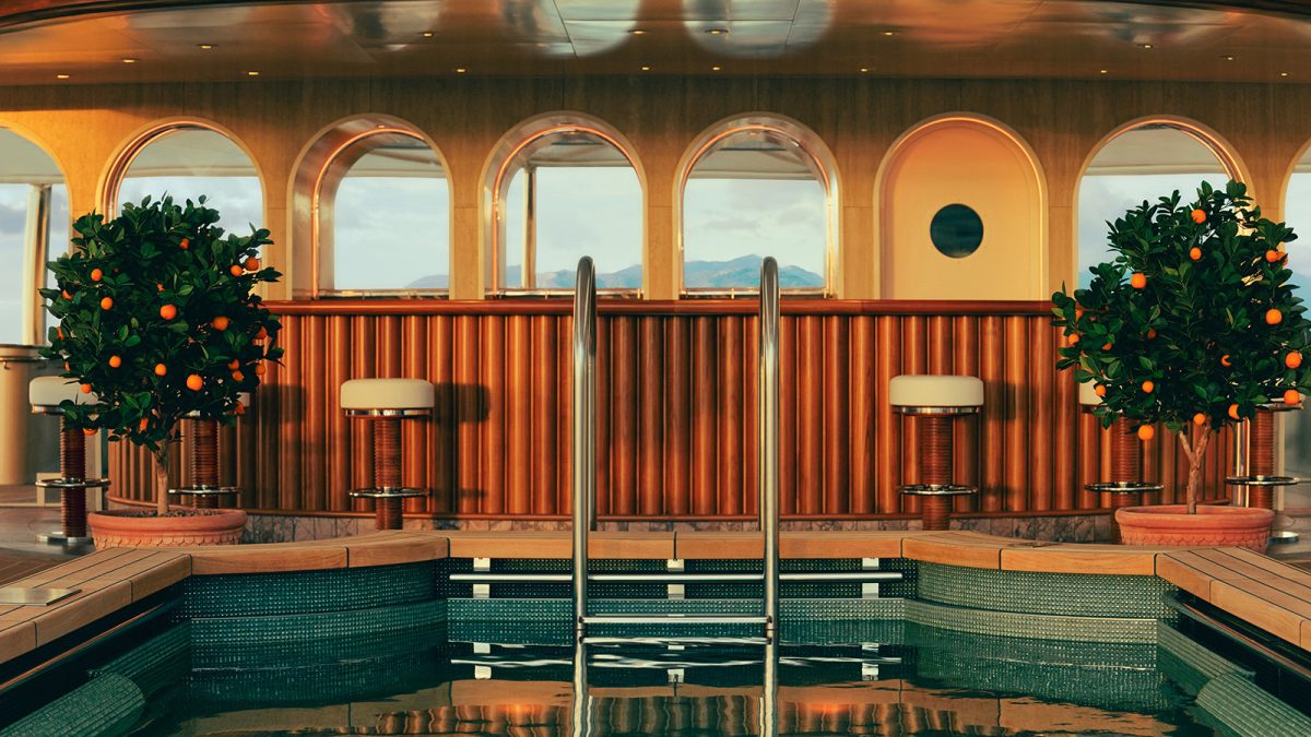 Four Seasons I indoor pool with arched windows overlooking Mediterranean coastline