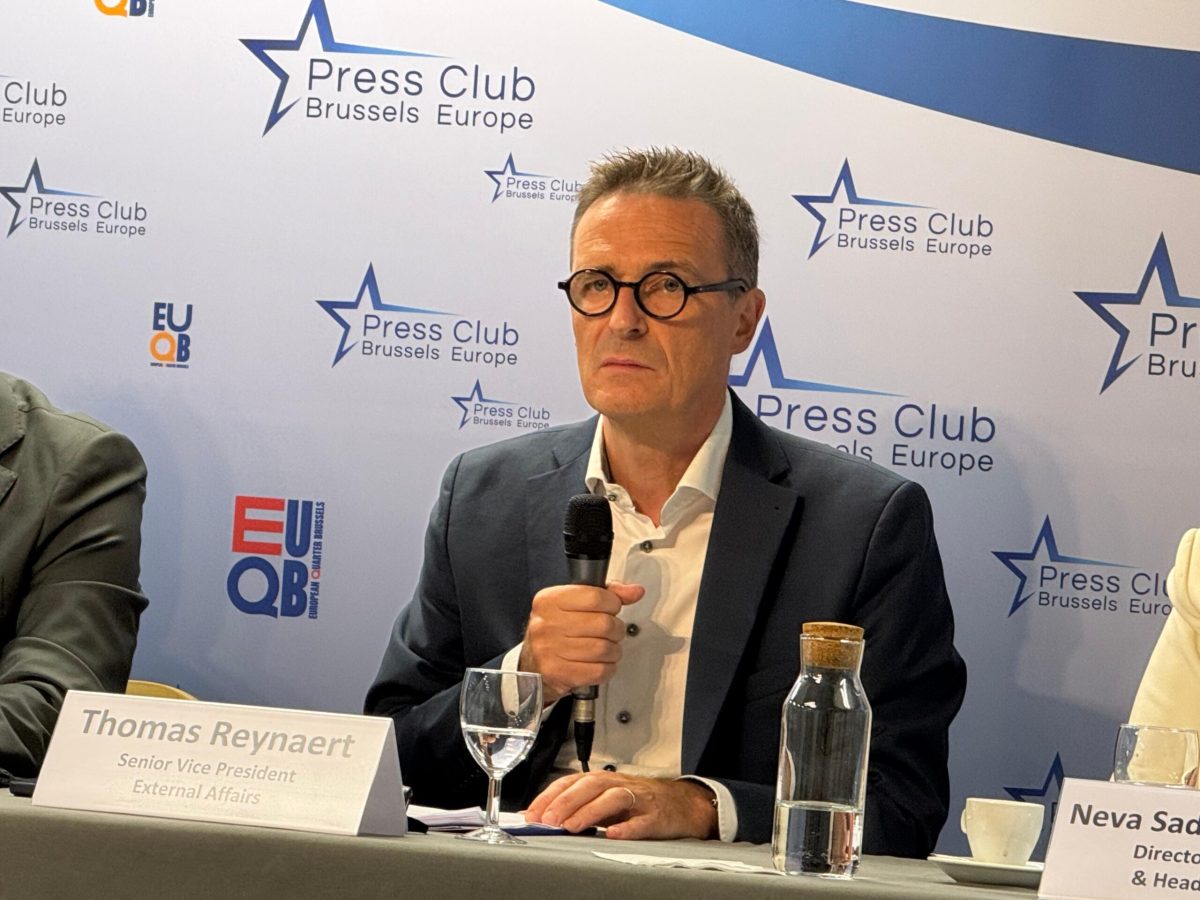IATA representative speaking at Brussels Press Club panel about EES travel system