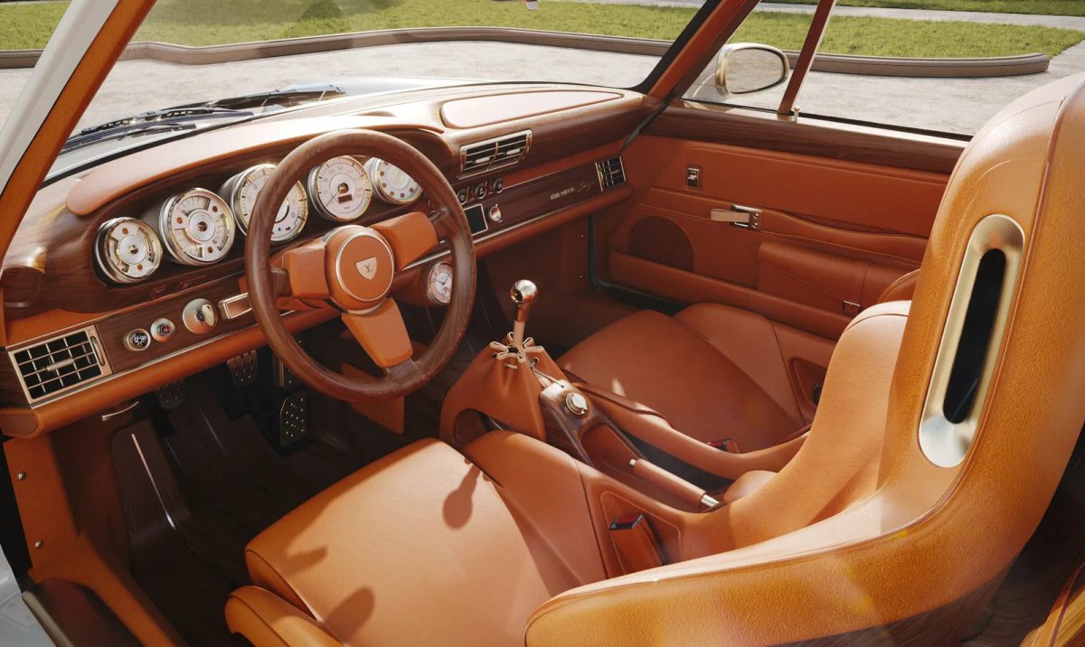 Interior of custom Porsche 911 with cognac leather seats and matching steering wheel