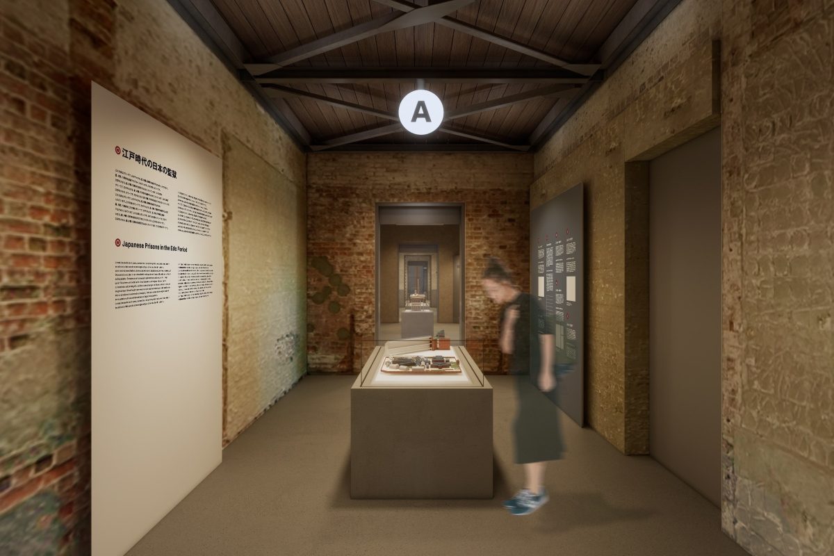 Interior of historic prison corridor converted into luxury hotel exhibition space