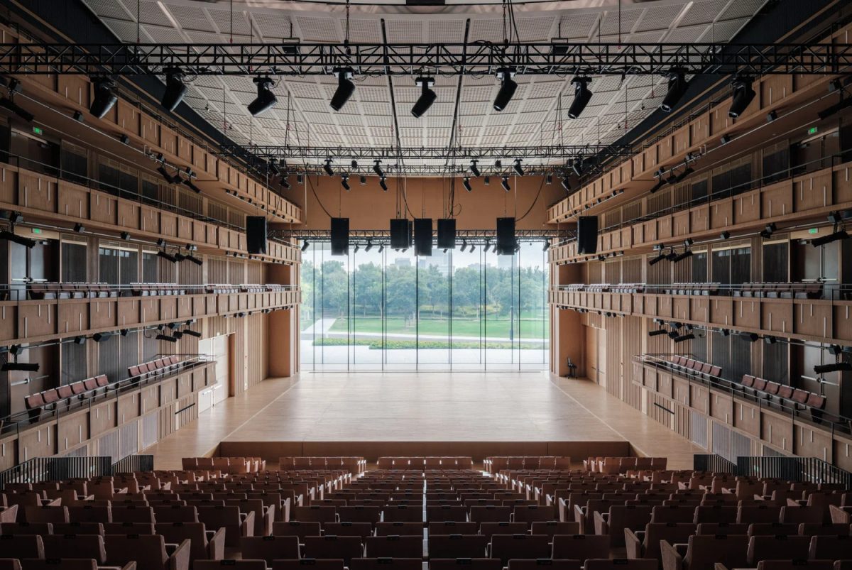 Interior view of Shanghai's Grand Opera House, showcasing its tiered seating and expansive stage.
