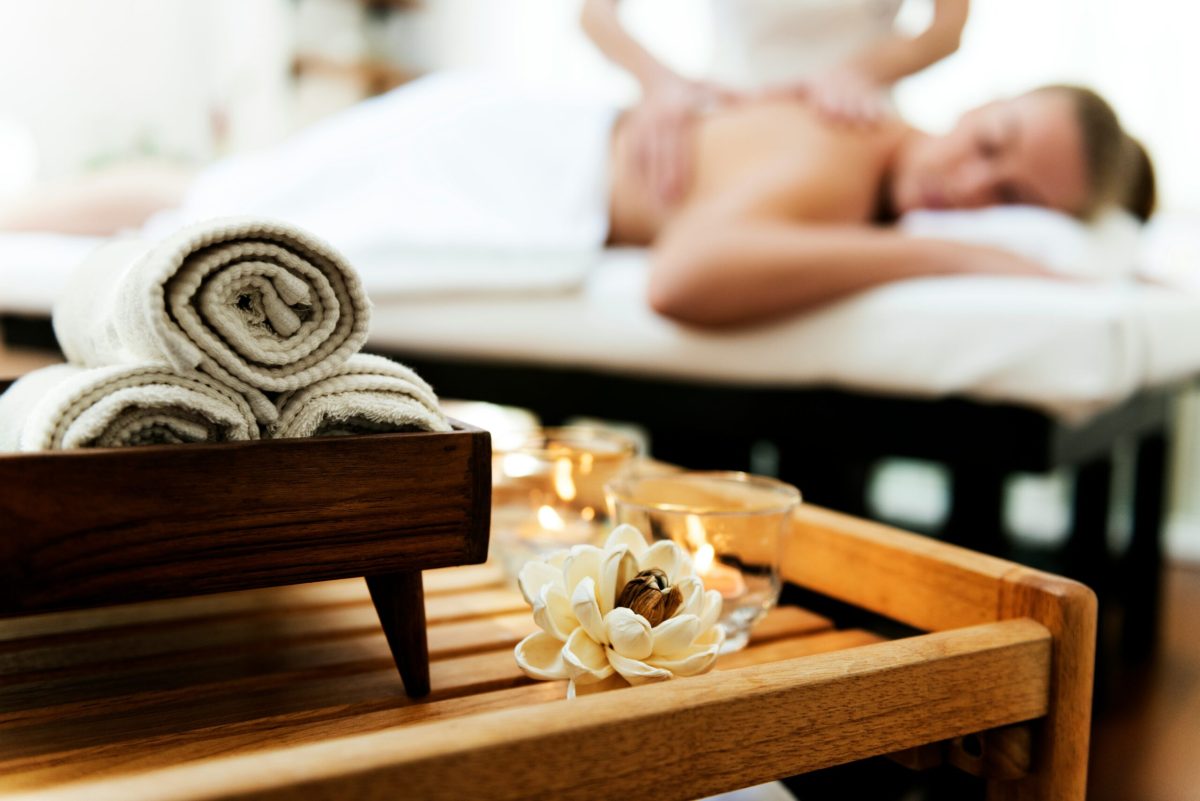 Relaxing massage in a luxurious Italian spa setting.