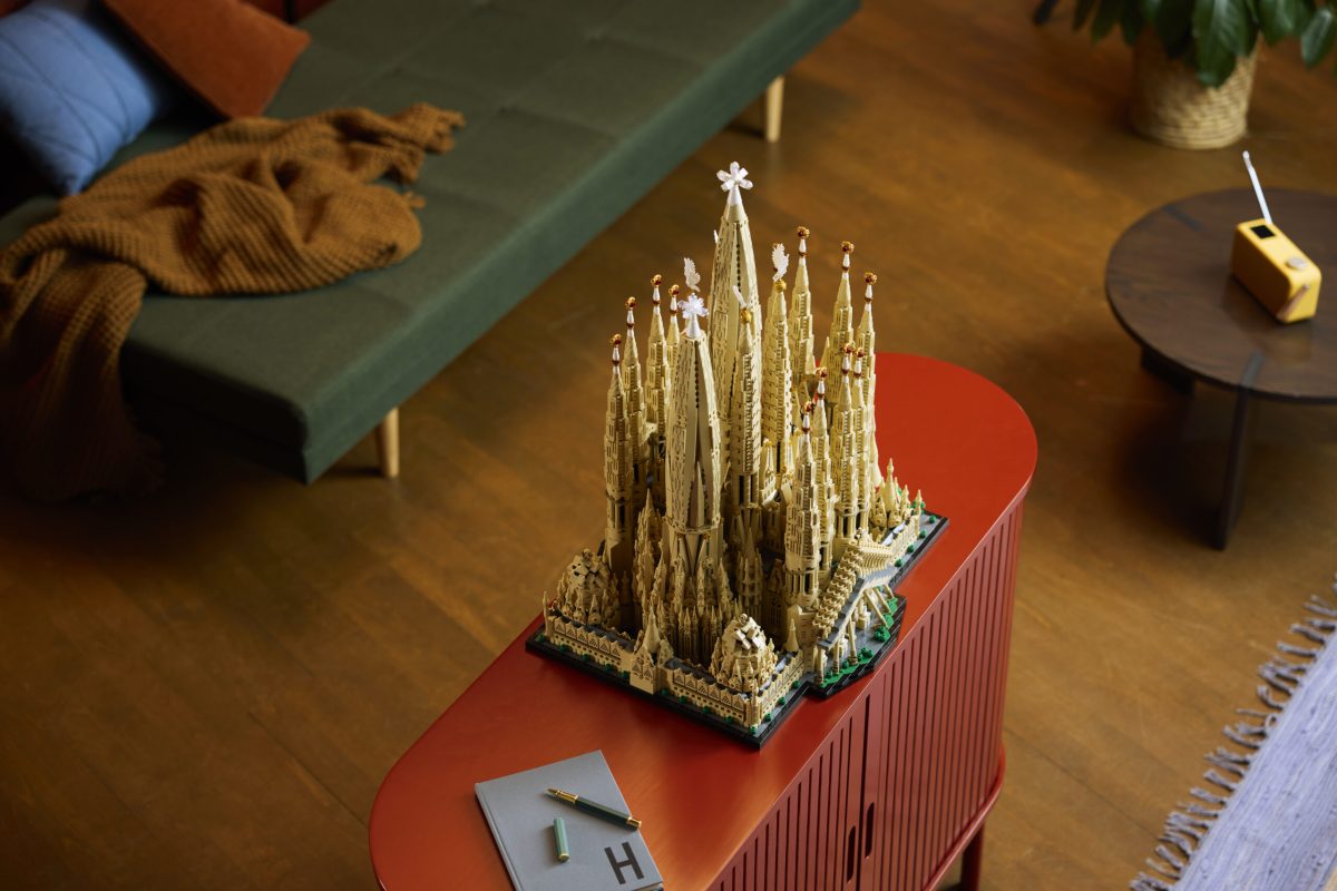 LEGO Sagrada Família model displayed on red platform indoors
