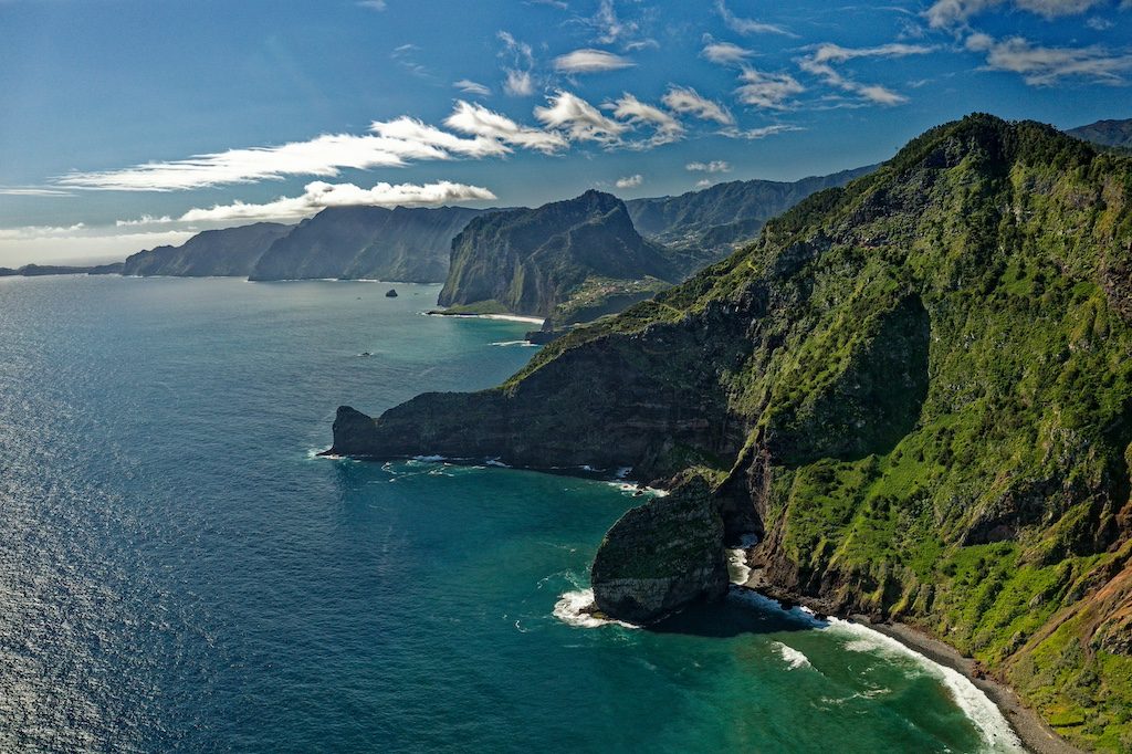 Dramatic coastal cliffs and turquoise waters of Madeira's rugged shoreline