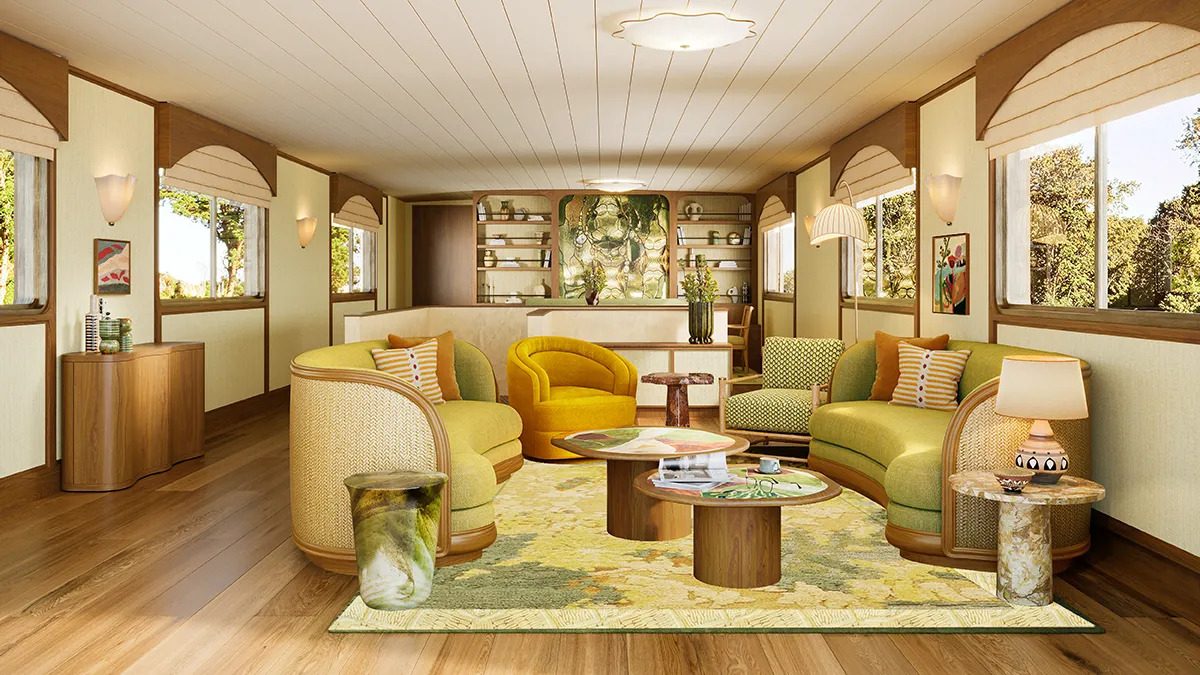 Marguerite riverboat's elegant lounge with yellow chairs and natural light from windows