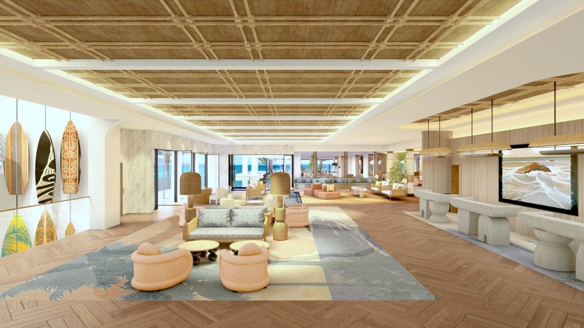 Modern lobby lounge with wooden ceiling, ocean views, and contemporary furniture at Outrigger Waikīkī
