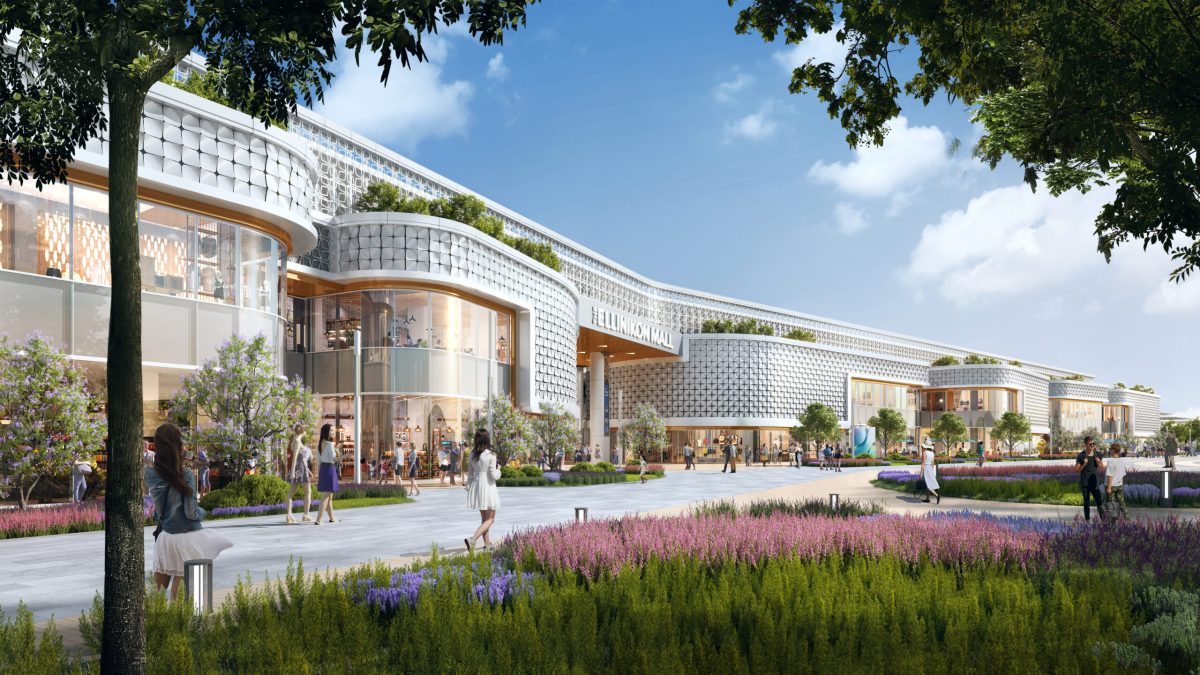 Modern waterfront development with curved buildings, green spaces, and flowering gardens at The Ellinikon in Athens