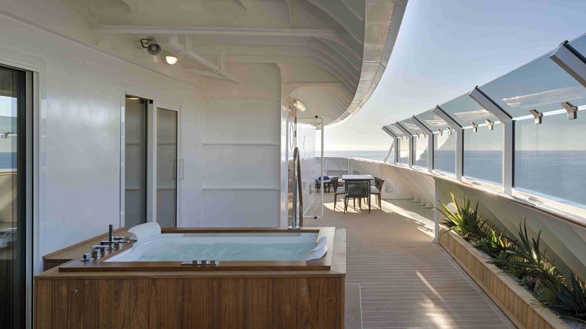 MSC Yacht Club suite with hot tub on private deck overlooking the sea