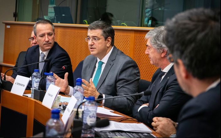 OECD officials discuss tourism policy challenges at a conference panel