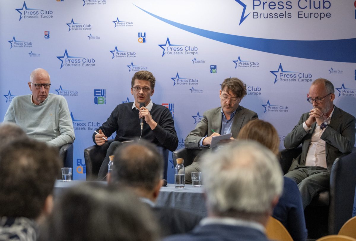 Panel of experts discussing climate action at Brussels Press Club event