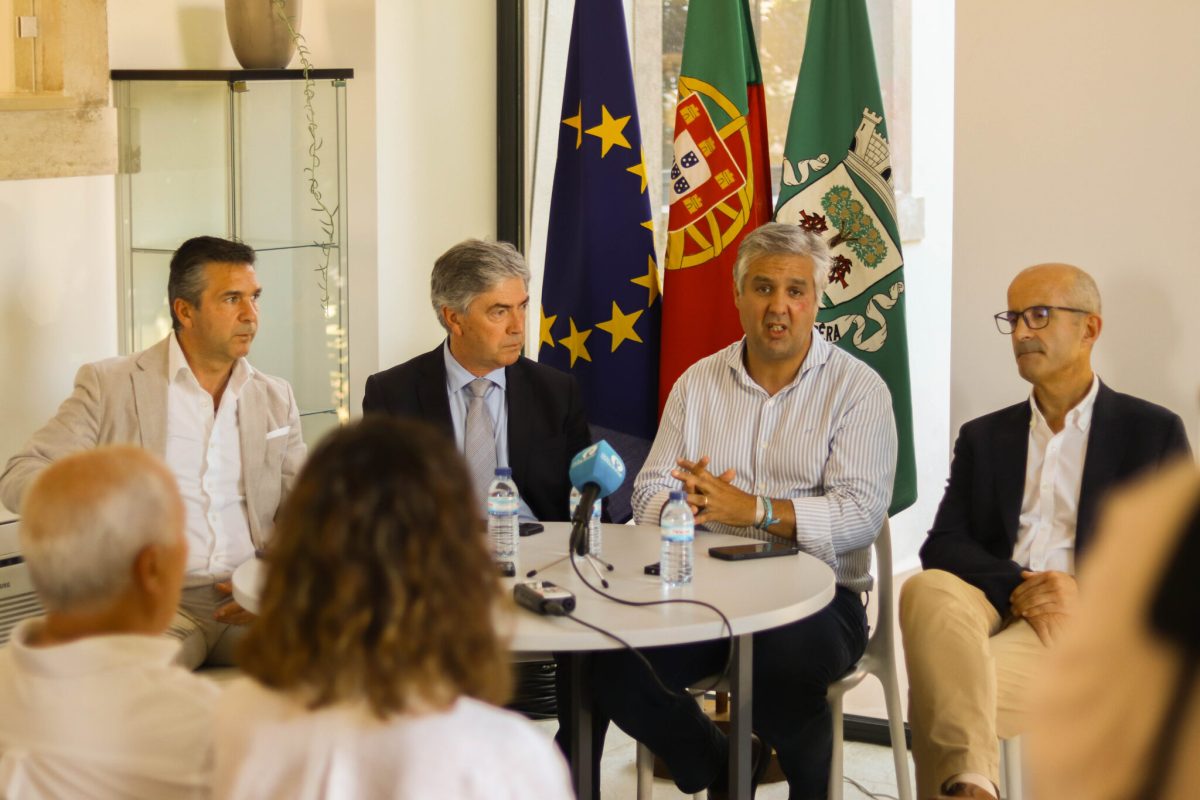 Panel of officials discussing Portugal's adventure park project at a press conference