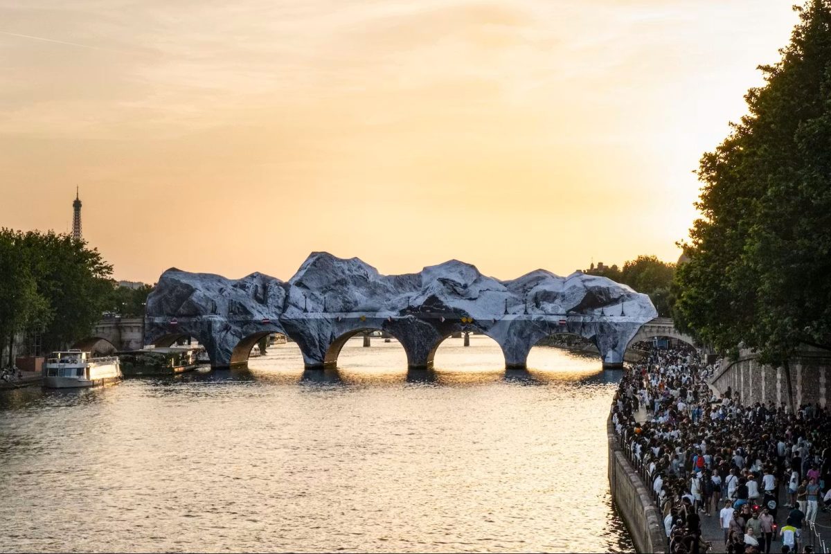Pont Neuf bridge wrapped in white fabric creating a cave-like tunnel over the Seine River