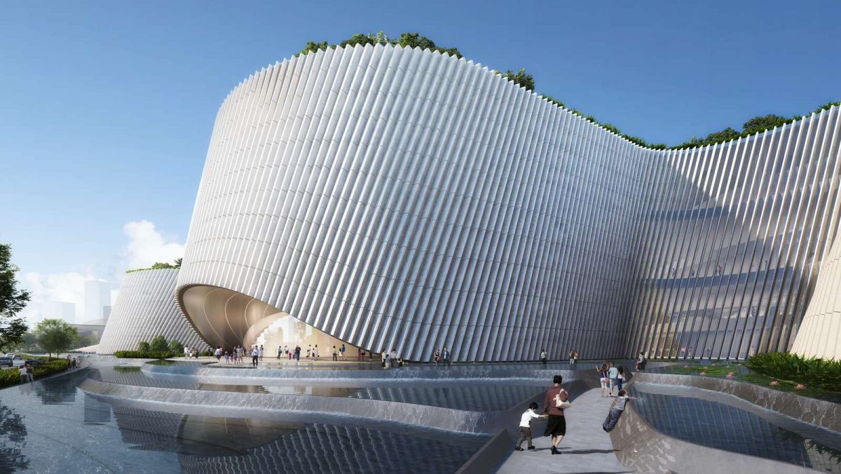 Shenzhen Natural History Museum's undulating white corrugated exterior reflecting in water