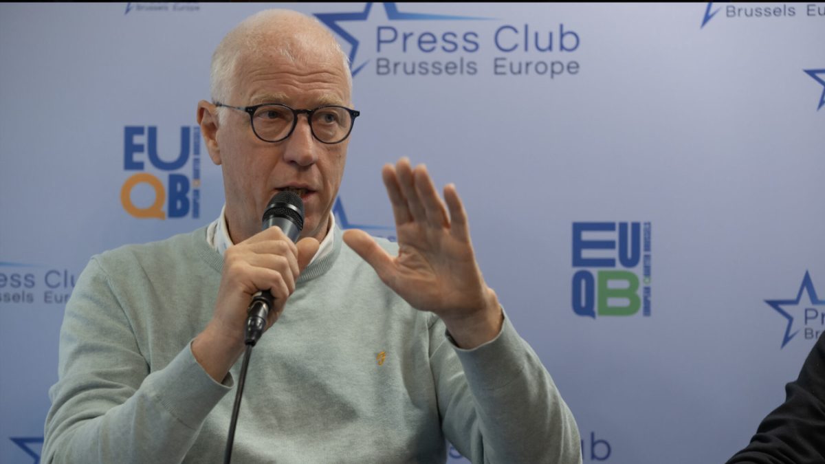 Speaker at Brussels Press Club addressing climate action at COP31 conference