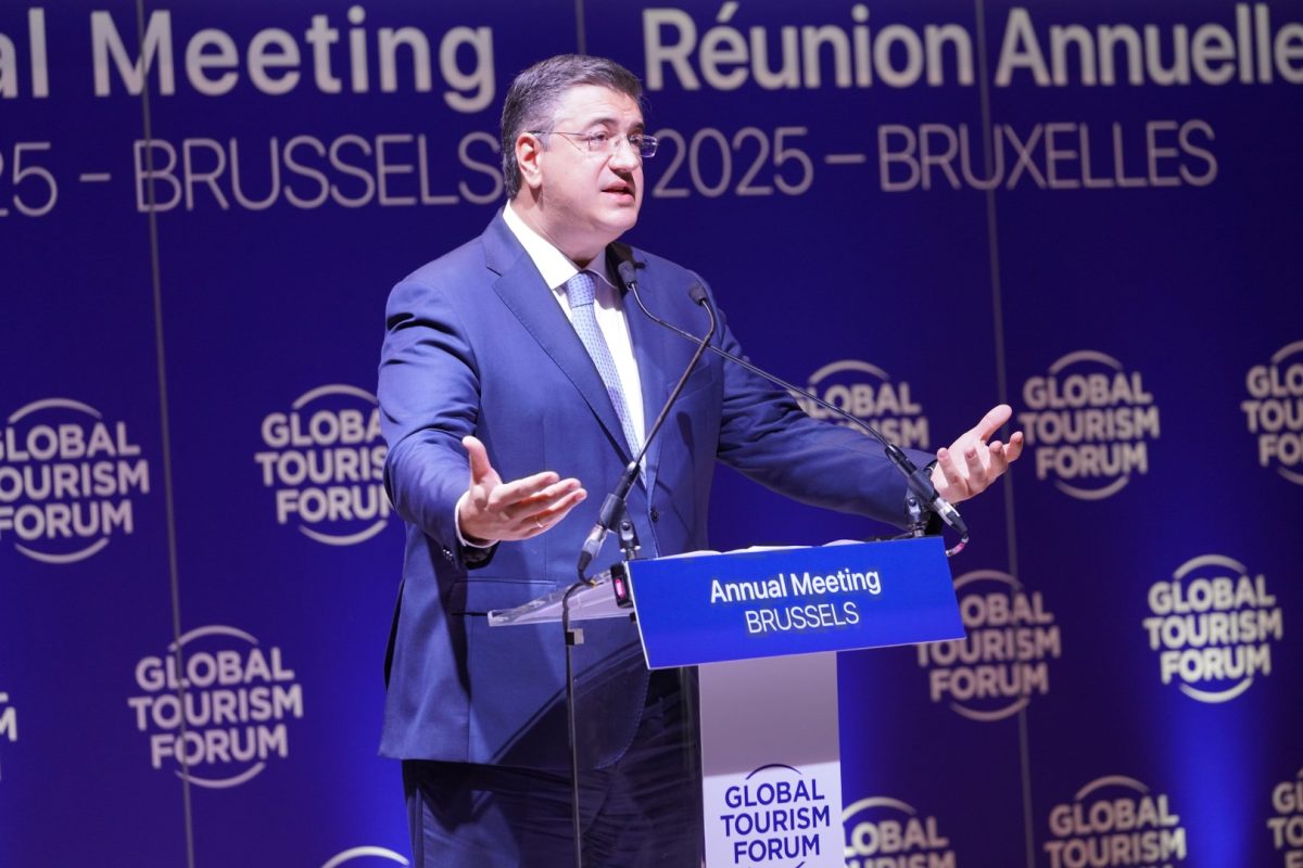 Speaker presenting at Global Tourism Forum annual meeting in Brussels 2025