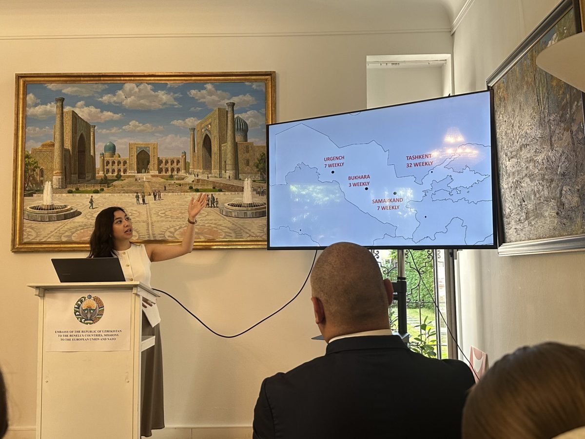 Tourism presentation about Uzbekistan showing map and cityscape imagery
