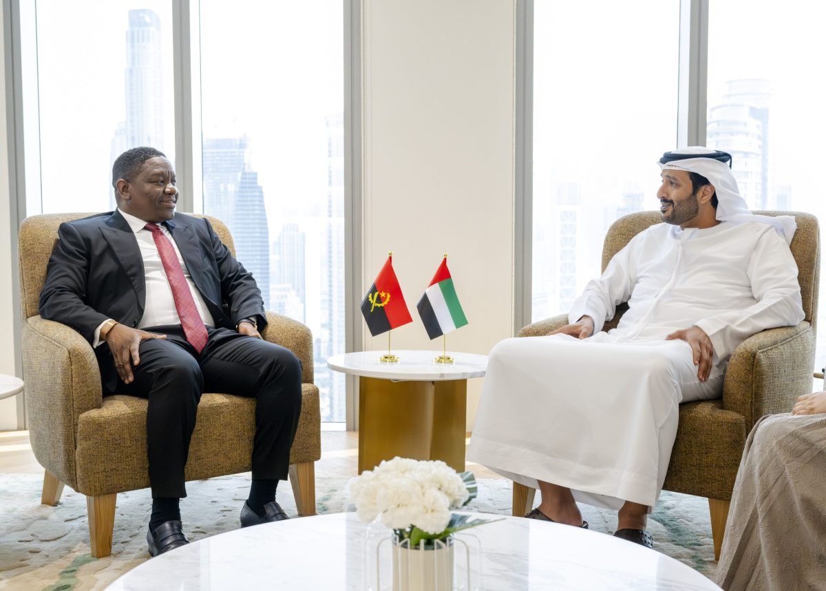 Two officials from Angola and UAE in discussion during bilateral meeting