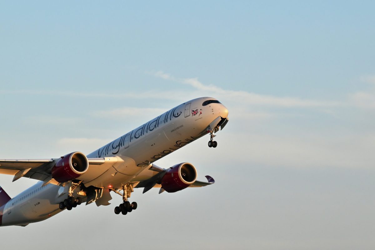 Virgin Atlantic aircraft taking off against clear sky