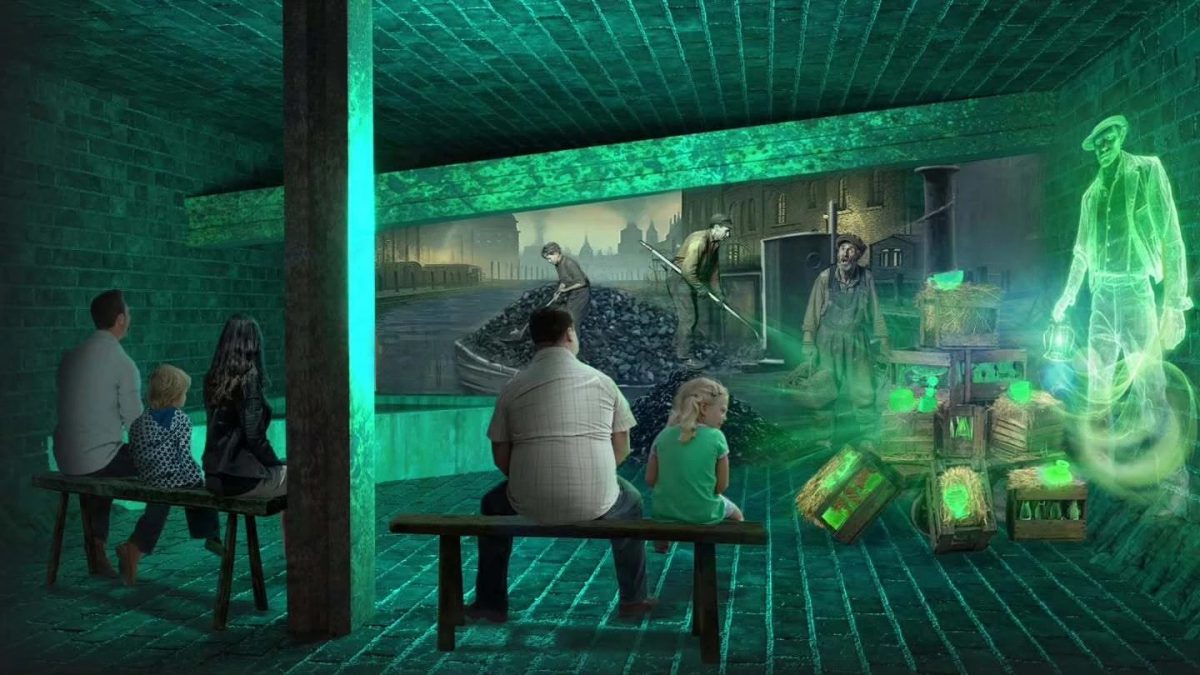 Visitors experiencing an immersive green-lit digital display in historic glassmaking tunnels