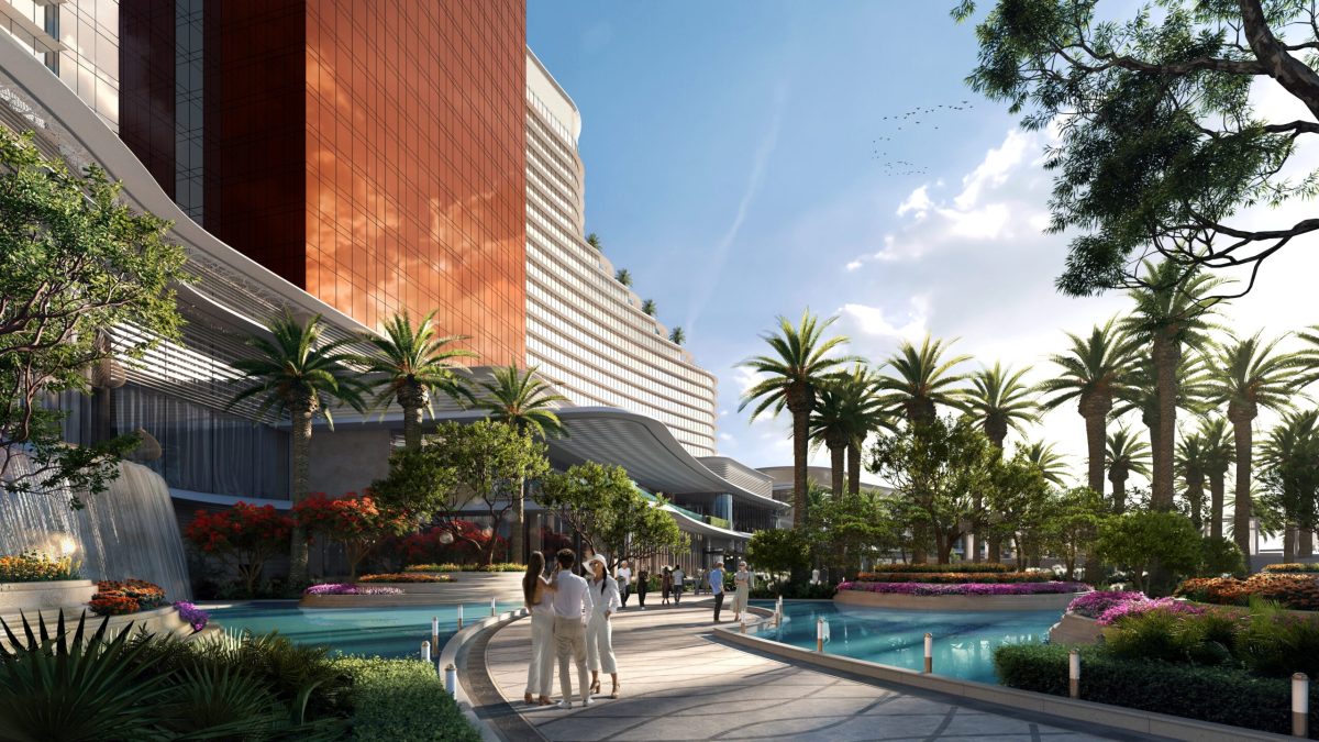 Wynn Al Marjan Island resort rendering with palm trees and waterfront plaza