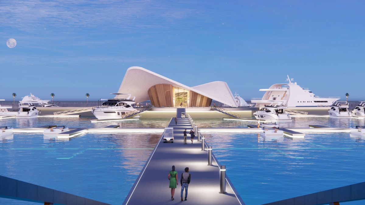 Wynn Al Marjan Island resort with curved white architecture reflected in blue water